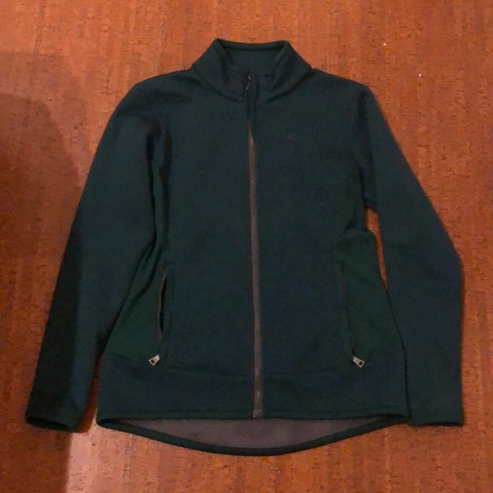 Under armor fitted forest green jacket. Size xs.